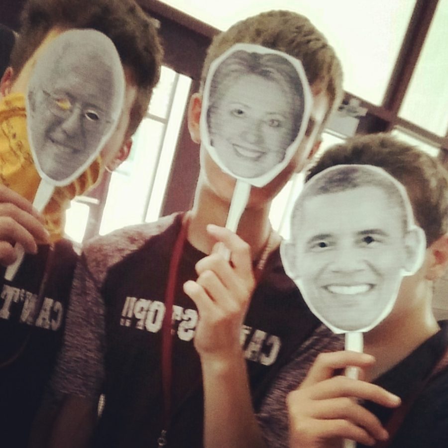 Progressive Club officers all together wearing masks of famous progressive politicians.