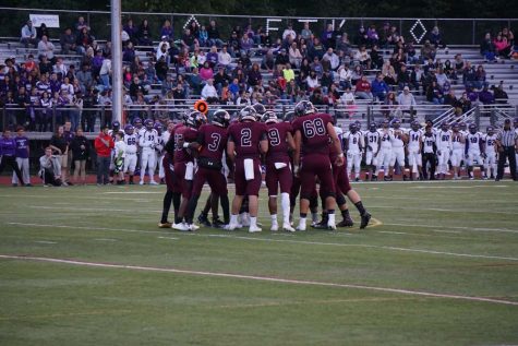 Football team keeps the Little Brown Jug in Mini-THON take-over game