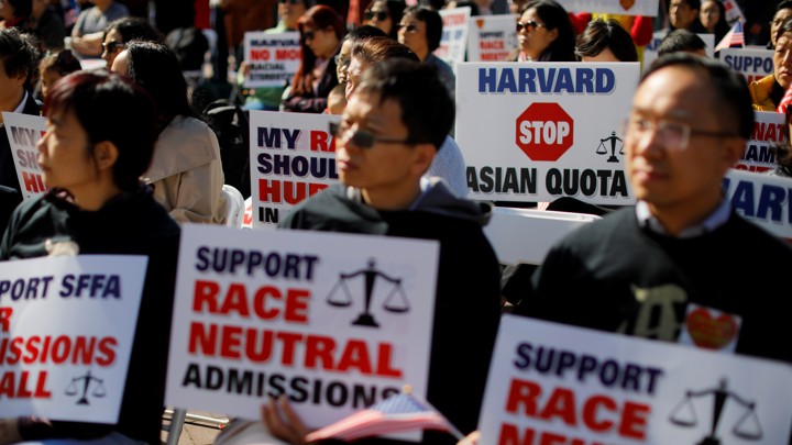 Supporters+attend+the+Rally+for+the+American+Dream+-+Equal+Education+Rights+for+All%2C+ahead+of+the+start+of+the+trial+in+a+lawsuit+accusing+Harvard+University+of+discriminating+against+Asian-American+applicants%2C+in+Boston%2C+Massachusetts%2C+U.S.%2C+October+14%2C+2018.+++REUTERS%2FBrian+Snyder+-+RC15675290B0