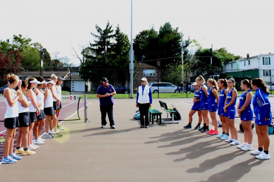 The+girls+varsity+tennis+team+and+Nazareth+tennis+team+line+up+to+introduce+each+player+and+his+or+her+position.