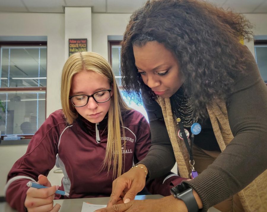 Mrs. Nadine Edwards works with student Kaela Van Horn in her Fundamentals of Math class at Stroudsburg High School.
