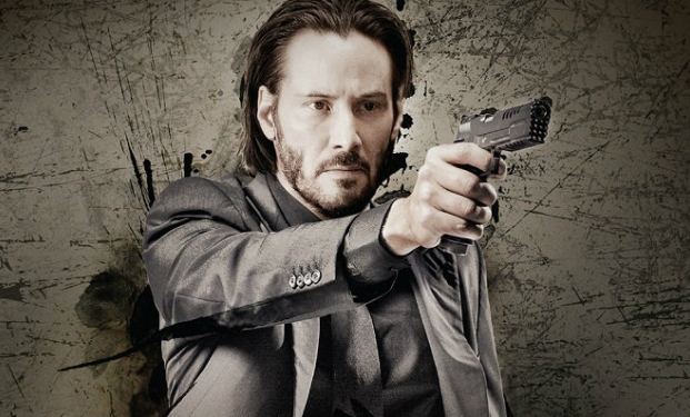 Photo via farefilm.it.
John Wick from the John Wick movies holding a gun.