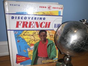 A French 3 students textbook and globe are pictured in the above photo.