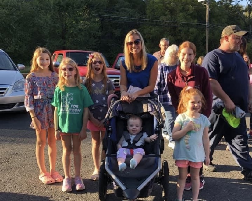 Photo of Ms. Wilson and some of her students at a fundraiser for Hamilton School that took place at Janes Ice Cream. 