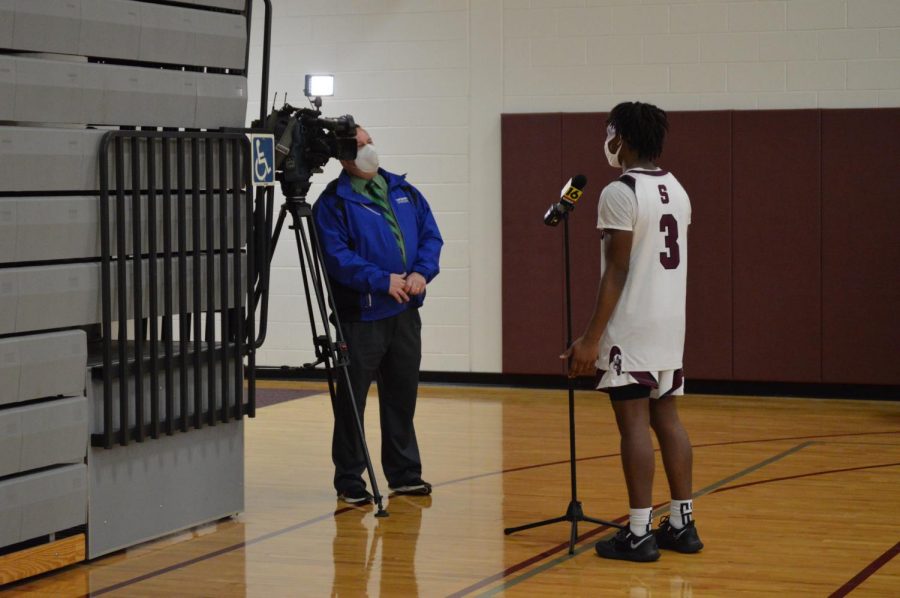 Senior Jahkai Barnes is interviewed by Channel 16 news after a home win over Pocono Mountain West on Tuesday, February 16.