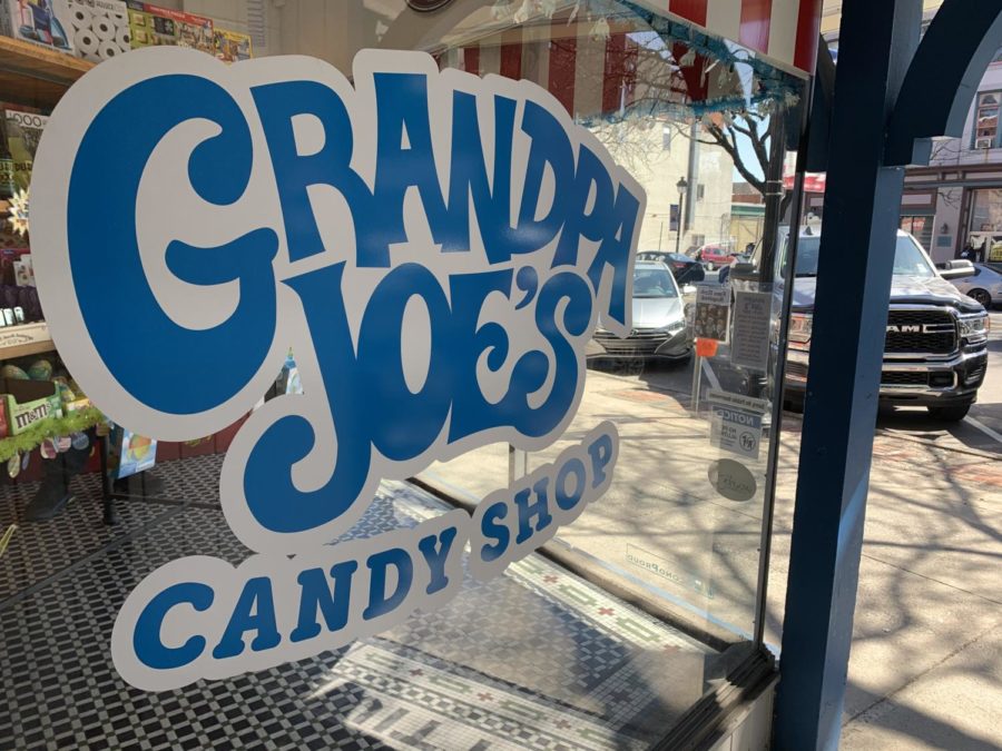 The side window of "Grandpa Joe's Candy Shop". This store includes all sorts of sweets.