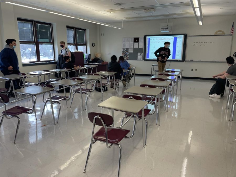 Students prepare for math class.