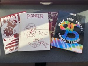 Yearbook covers that the Pioneer have made throughout the years.