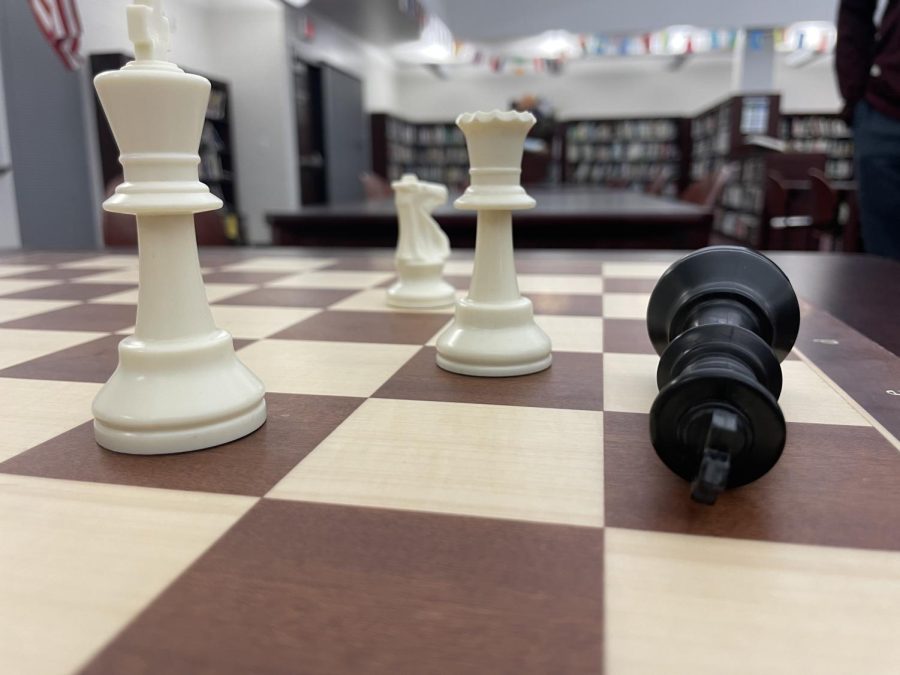 Photo+of+a+chess+board+and+pieces+by+Michael+Santini+