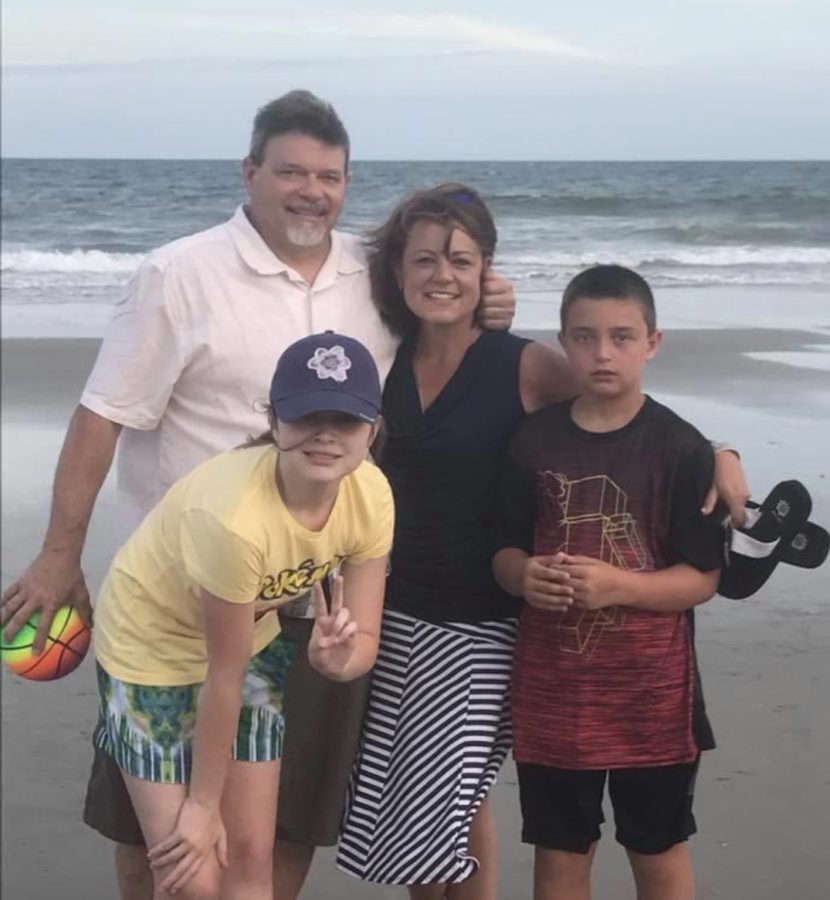 Teacher Feature on Ms. Emeigh and her family having a good time on the beach.
