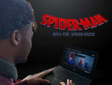 Mountaineer staff member Eric Card III watching the Spider-Man: Into the Spider-Verse 2018 trailer.