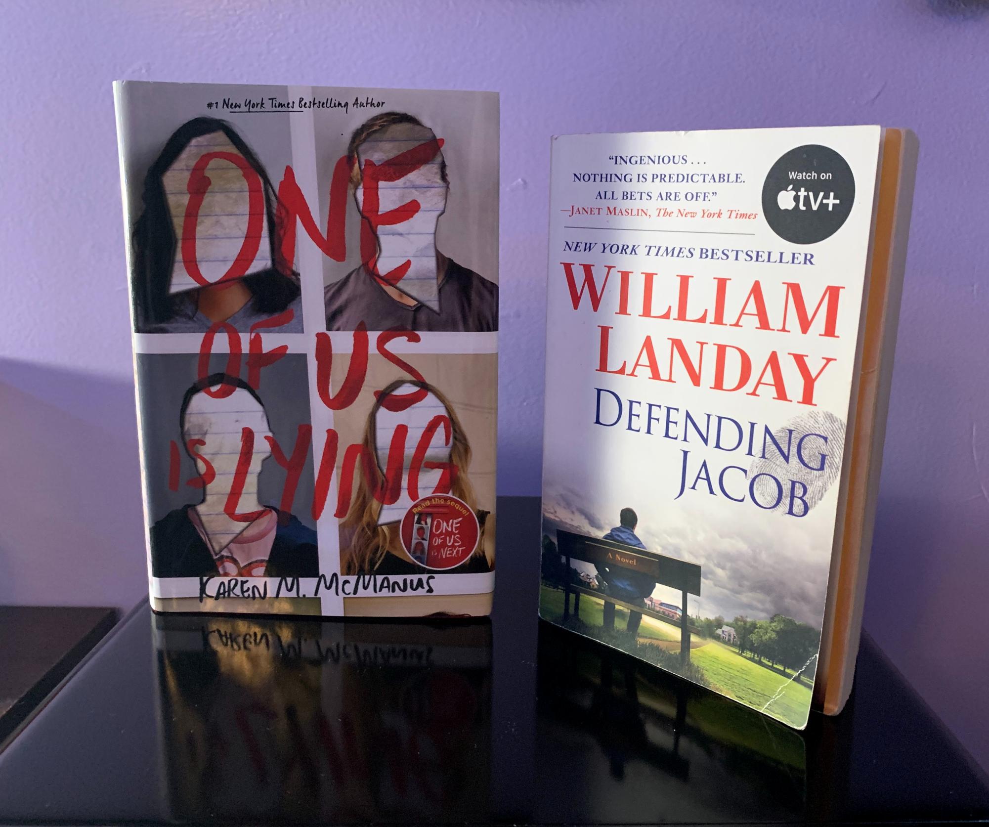 These are the books One of Us Is Lying,by Karen M. McManus, and Defending Jacob, by William Landay.