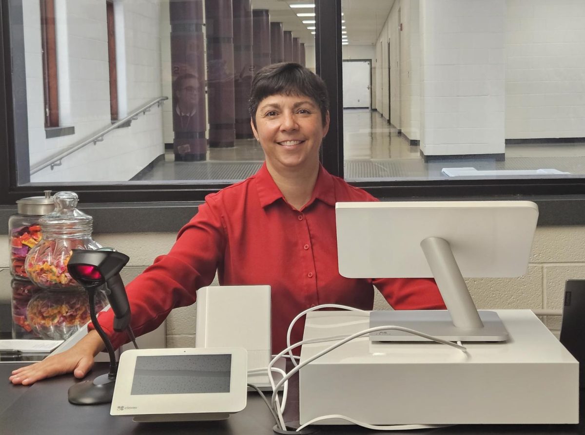 Ms.Heather Nowosad standing in The Mountaineer Market shortly after opening.