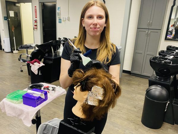 This is senior cosmetology student, Bryannah Zimmerman working on her next project.