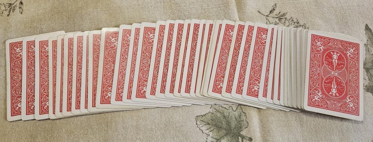 A deck of playing cards set up for a magic trick.