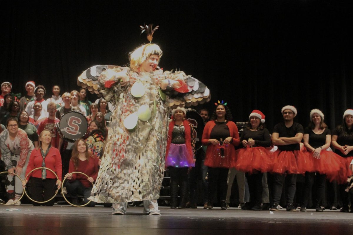 Ms. Austin had the singular role of a partridge in a pair tree in the 12 Days of Christmas skit. . 