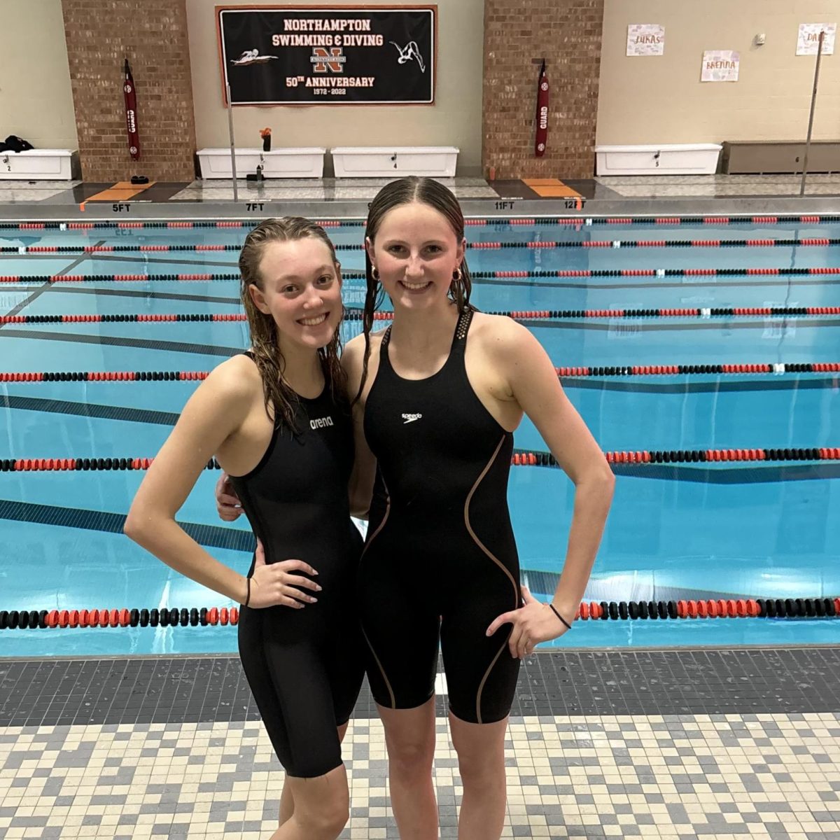 Two Stroudsburg High School girls swimmers after the race. Elizabeth Eberz (left) and Anna Kirby (right)