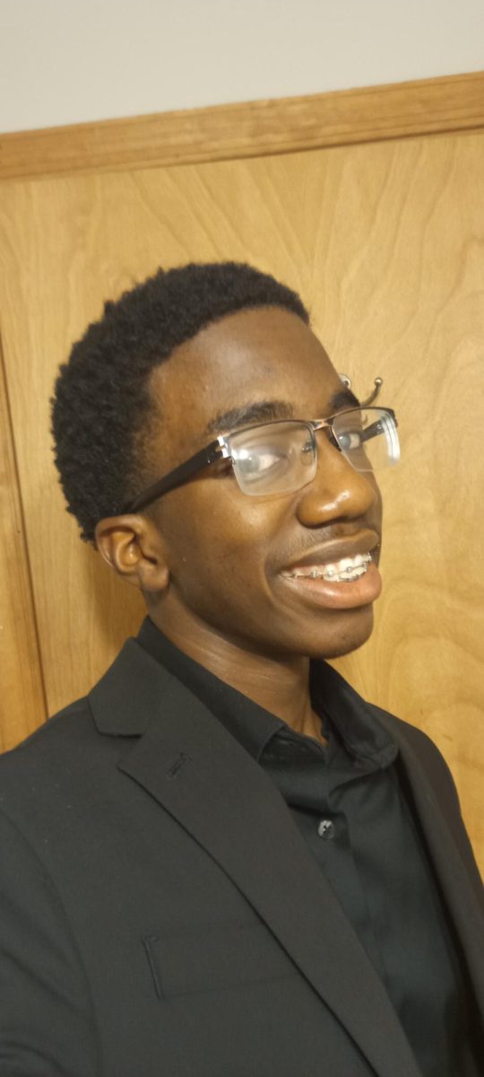 Photo of Stroudsburg High School Student William Awuah smiling into the camera.