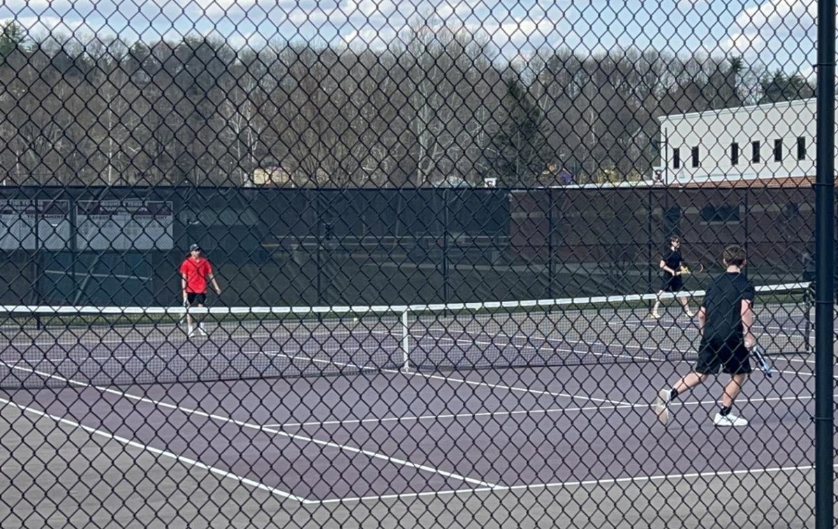 Stroudsburg Tennis player Logan Casebolt, 11, during match vs Easton Area High School on March 13th, 2023