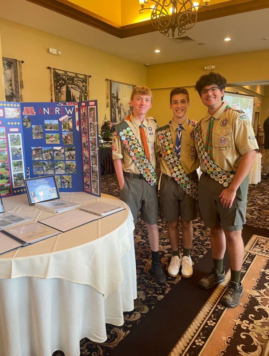 James Haggerty, 12, Andrew Hawks, 12, and Steven Blannard, 12, pose together to celebrate their achievements.