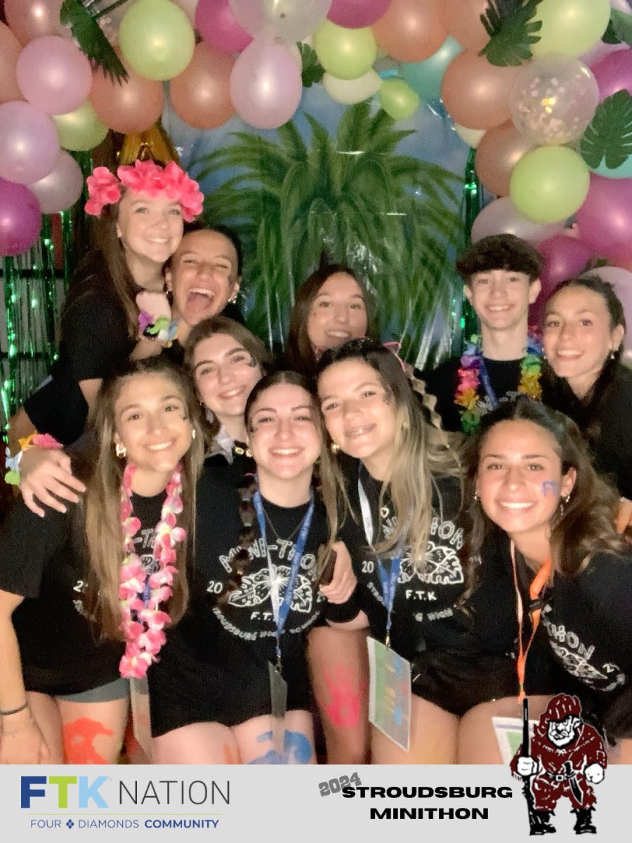 Executive members of Mini-thon take a moment to pose for a picture in the photo booth. Photo courtesy of Ms. Davis, Mini-thon, adviser. 