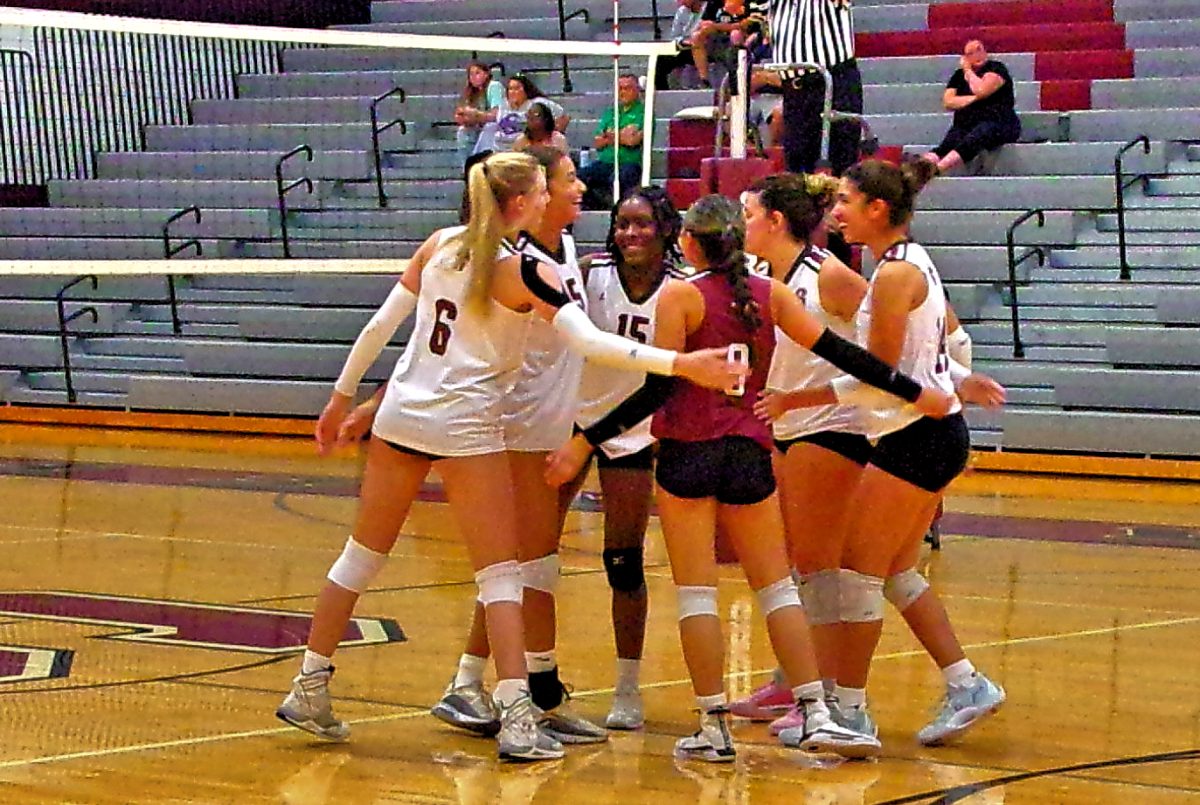 Stroudsburg Volleyball team huddles up during game in September 2024.