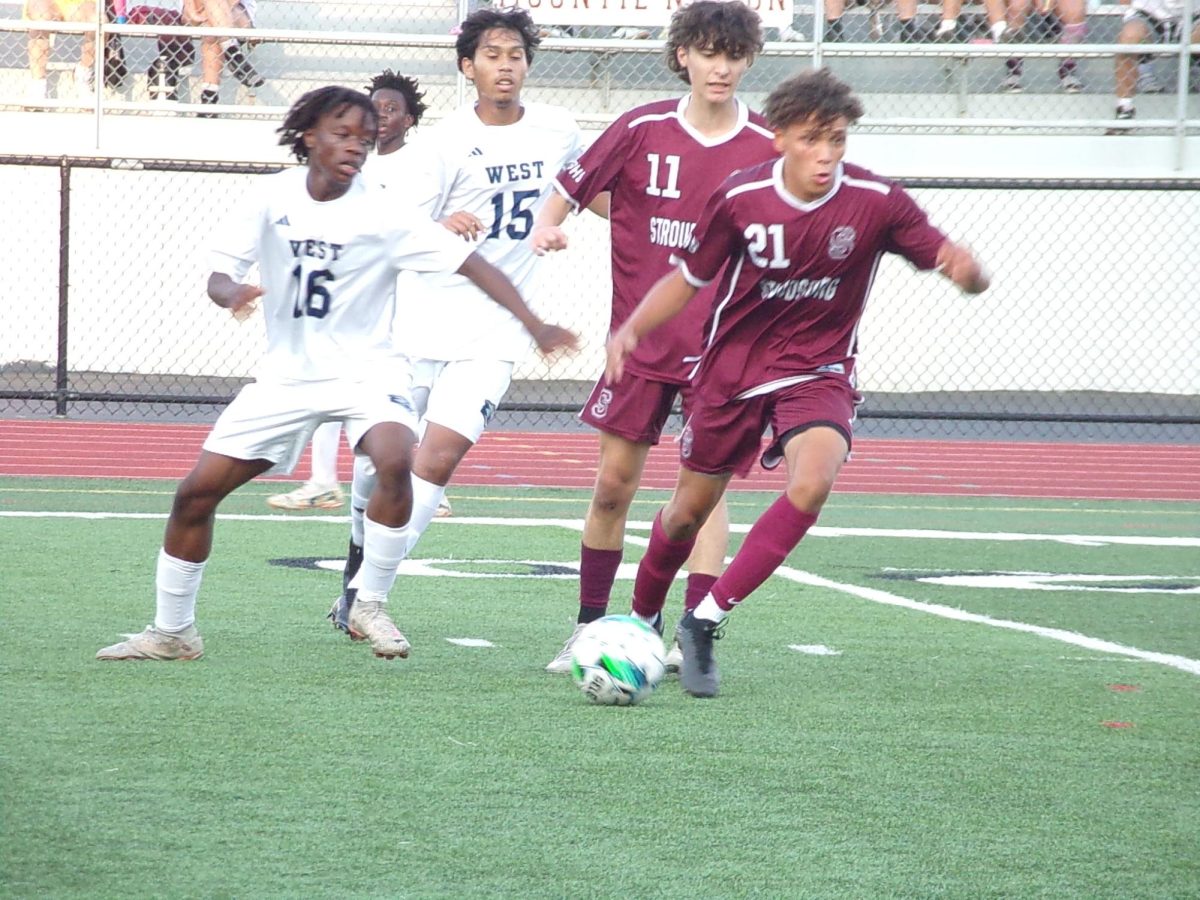 Michael Padilla, '25, successfully defending the ball from the Pocono Mountain West Soccer Team.