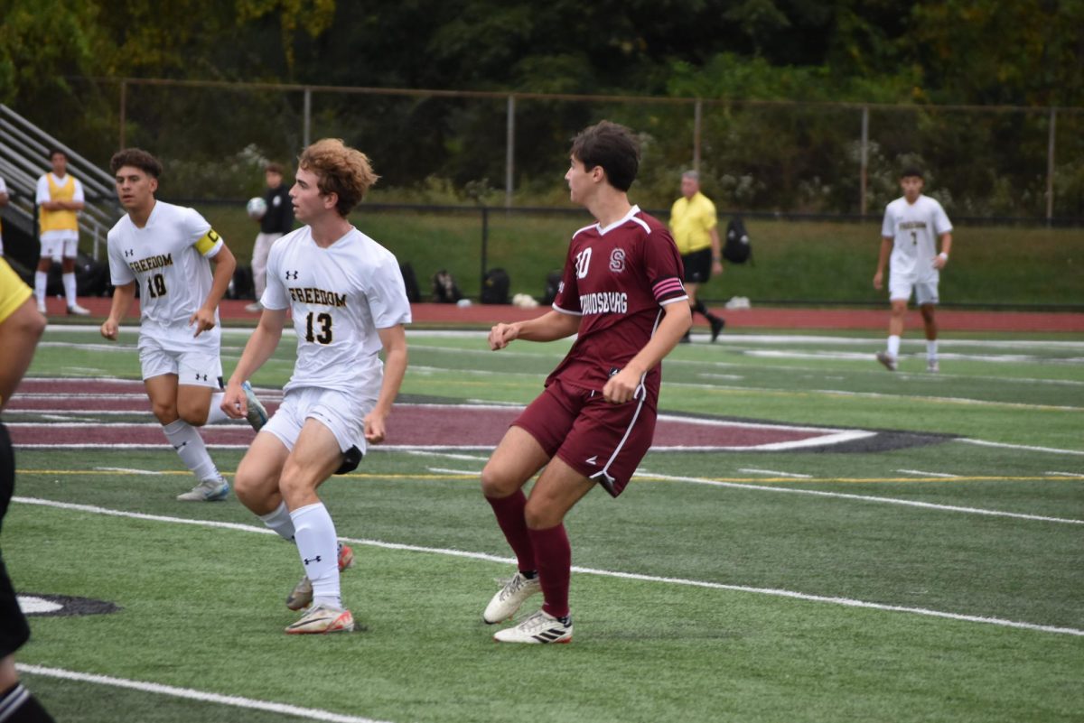 Stroudsburg's John Casey, 12, kicks the ball across midfield in Stroudsburg's game against Freedom on September 27, 2024.