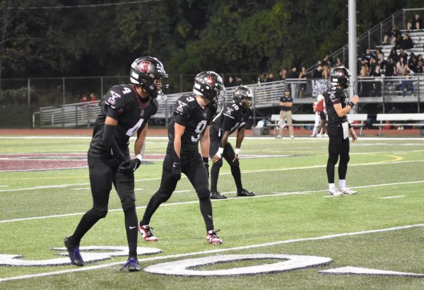 Kamari Coleman and Ethan Dudsak line up against Pocono Mountain East.