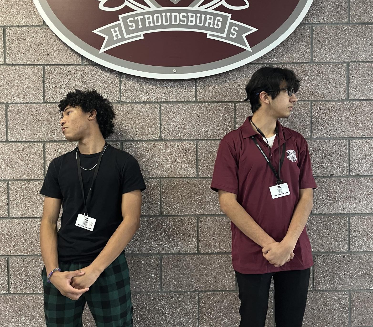 Two sides of the same coin. Two students at the same school, one in dress code, and the other one not. Does one student appear to be more professional than the other? 