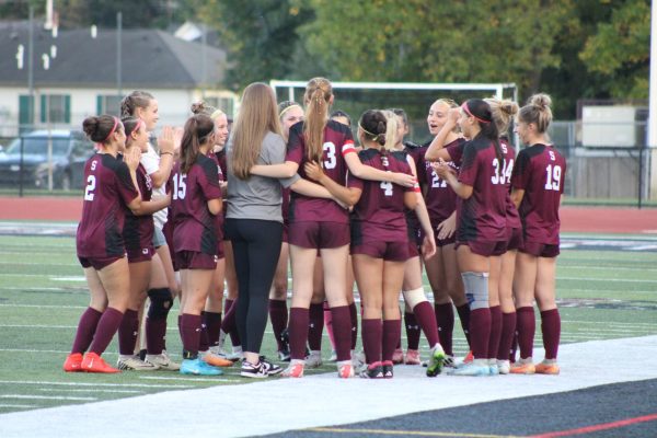 The Stroudsburg Girls Soccer team huddles together before their game against East Stroudsburg South.