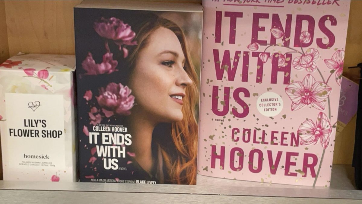 "It Ends With Us" books with different covers, including the movie cover, on display at a book store. 