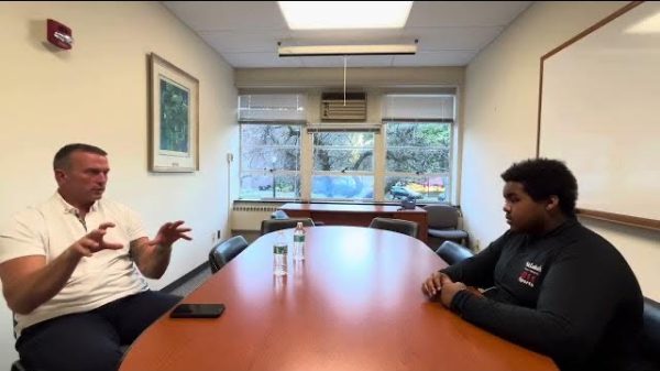 Chris Herren and Jaden Harper speak during the interview.