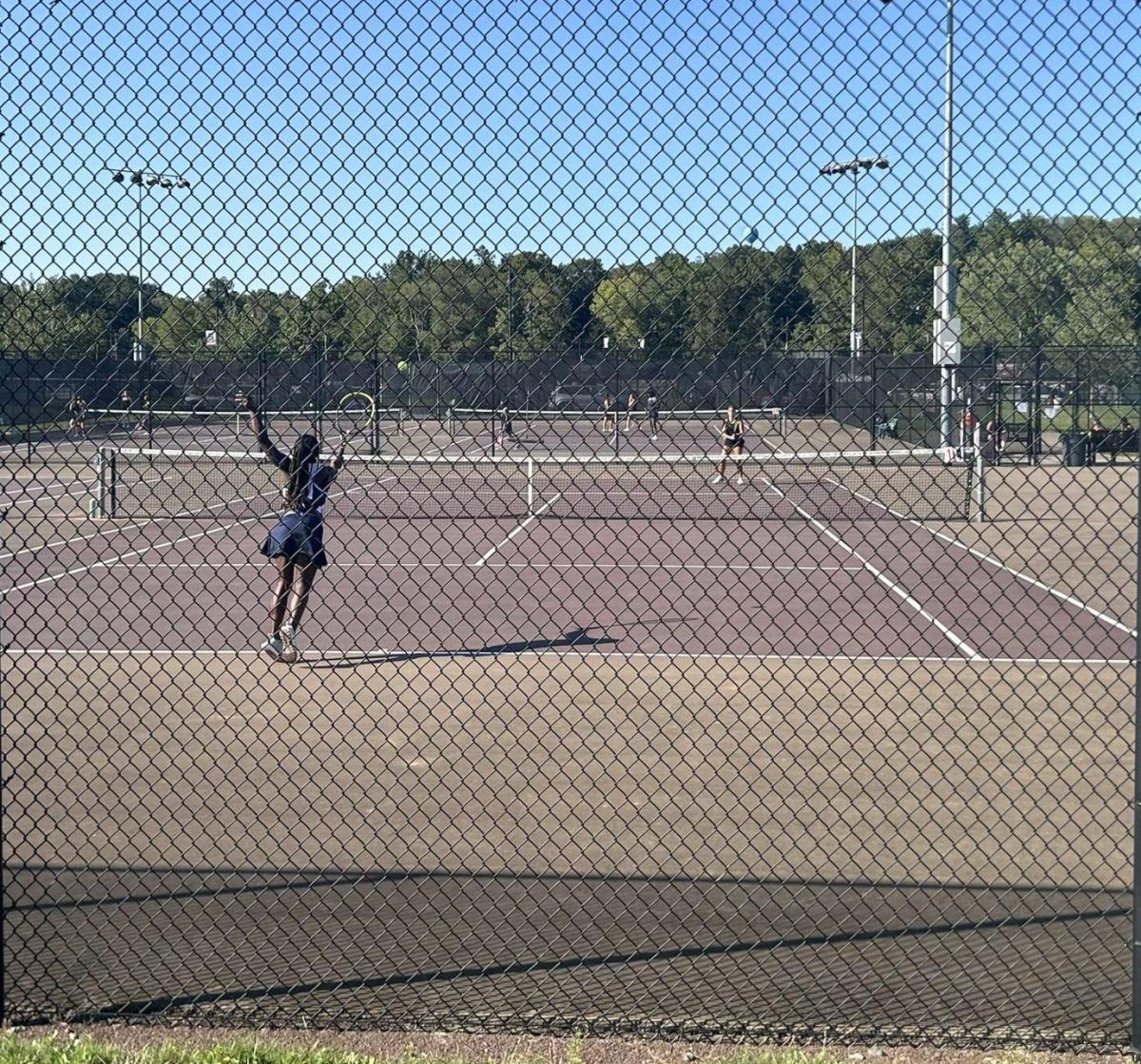 Serve during Stroudsburg Girls' Tennis match on September 11, 2024.