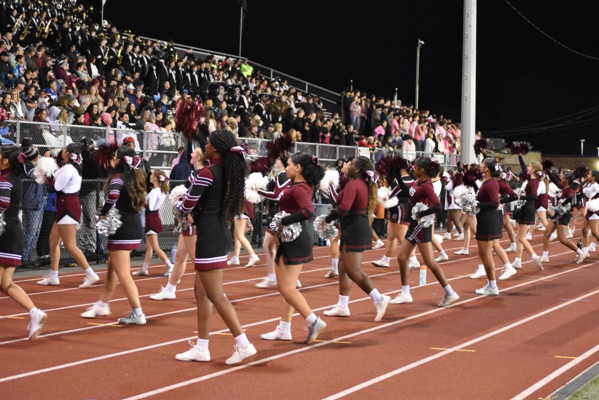 SHS Varsity Cheerleading is joined by the Middle School cheer group to help encourage and motivate the Mountie Maniacs and Mountie Nation.