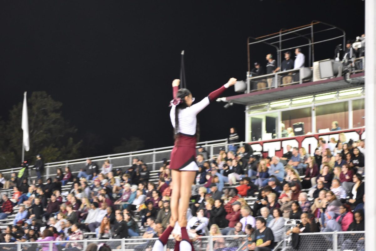 Cassandra Patel, '25, encourages her classmates through numerous tricks. 