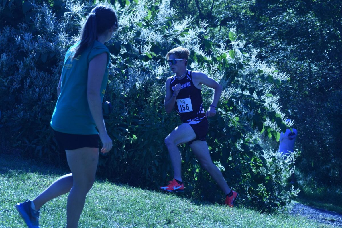 Aiden Nieman, '25, continues to progress from his previous placement during the meet.