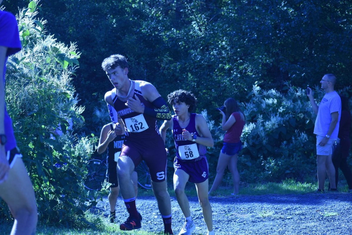 Samuel Sroka, '25, fights to maintain his current position in the race.