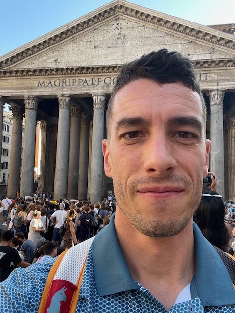 Mr.Carter posing in front of a historical building.
Photo provided by Mr.Carter