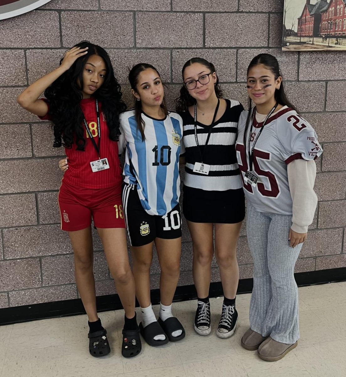 Nathalle Rodriguez '25, Shania Lyn '25, Julia Costigan '25, Saniye Duran '25 dressed for Mathlete vs. Athlete.