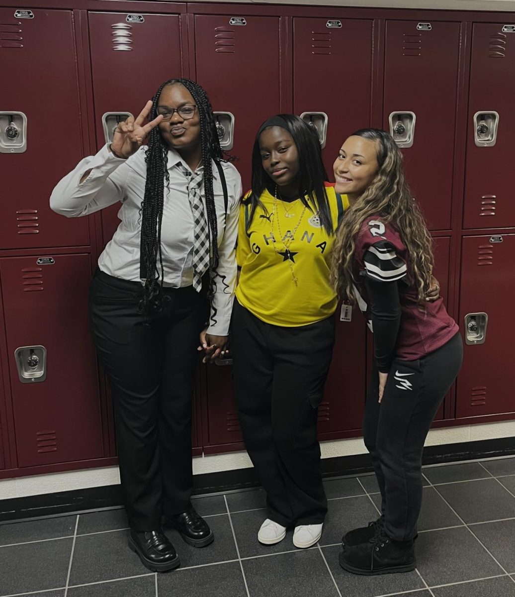 Abeena Aidoo '25 and Katelyn Hernandez '26, Destiny Allen '27 dressed for Mathlete vs. Athlete 