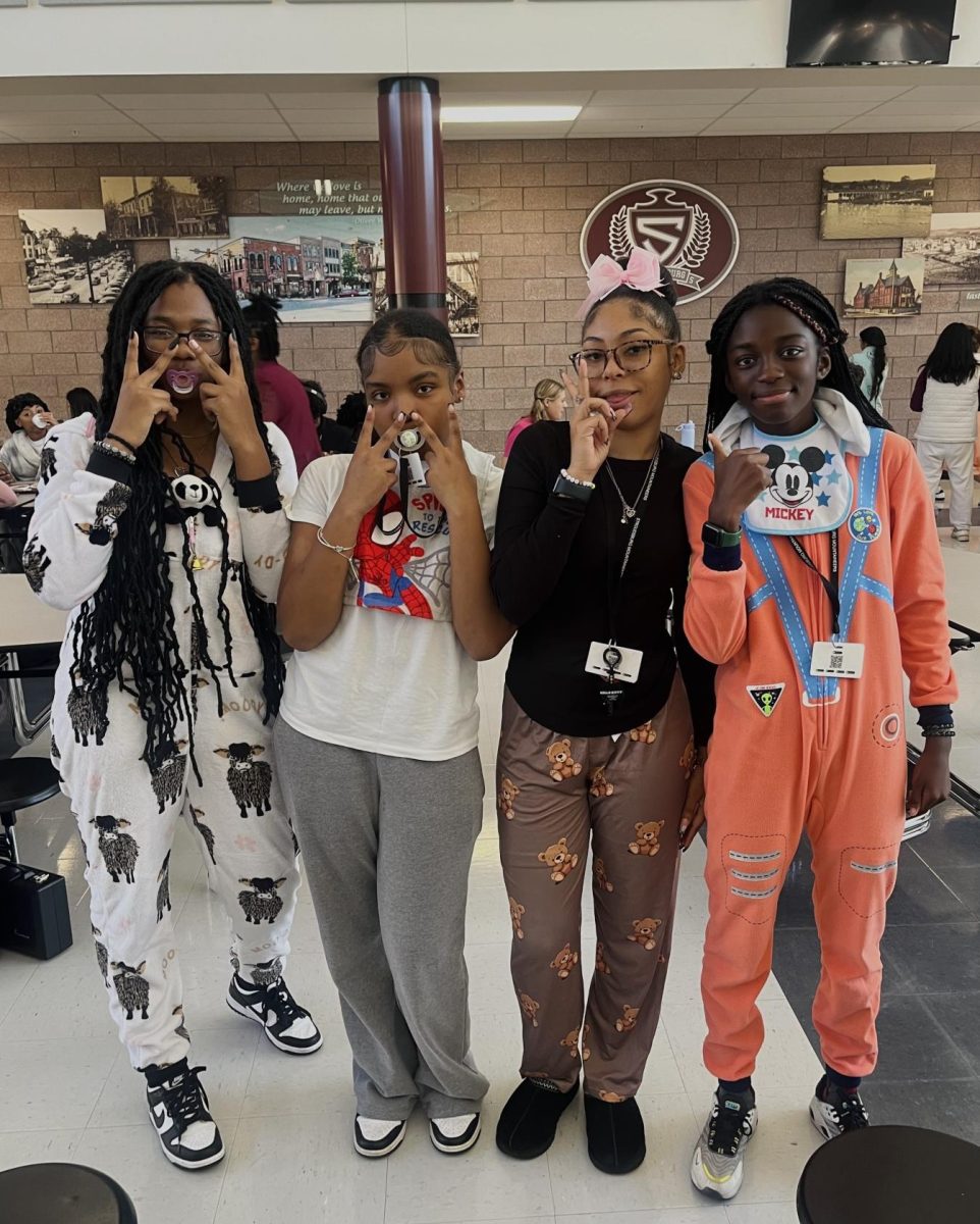 Lynette Johnson '27, Arianna Thomas '27, Skyler Mcfall '27, and Aniyah Jackson '27  dressed as babies for Dress Your Age