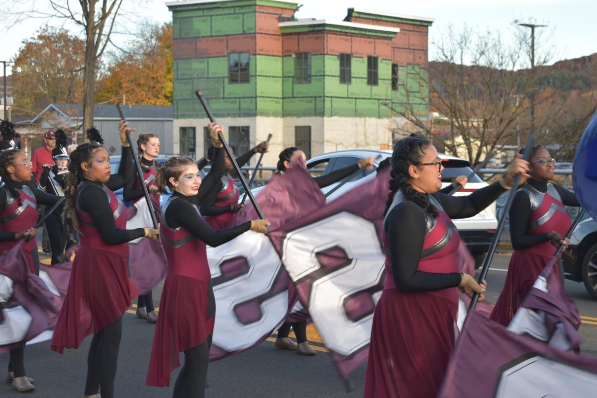 Stroudsburg color guard leads the parade towards Stroudsburg High School. 