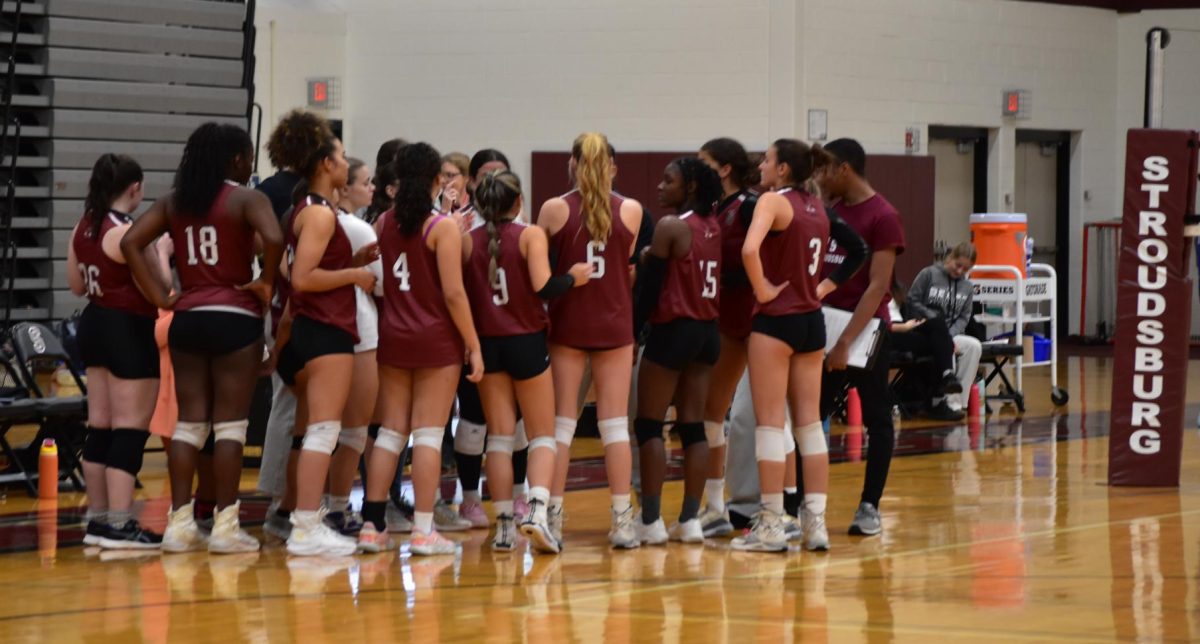 Stroudsburg Volleyball huddles during game against Pleasant Valley on October 9, 2024.