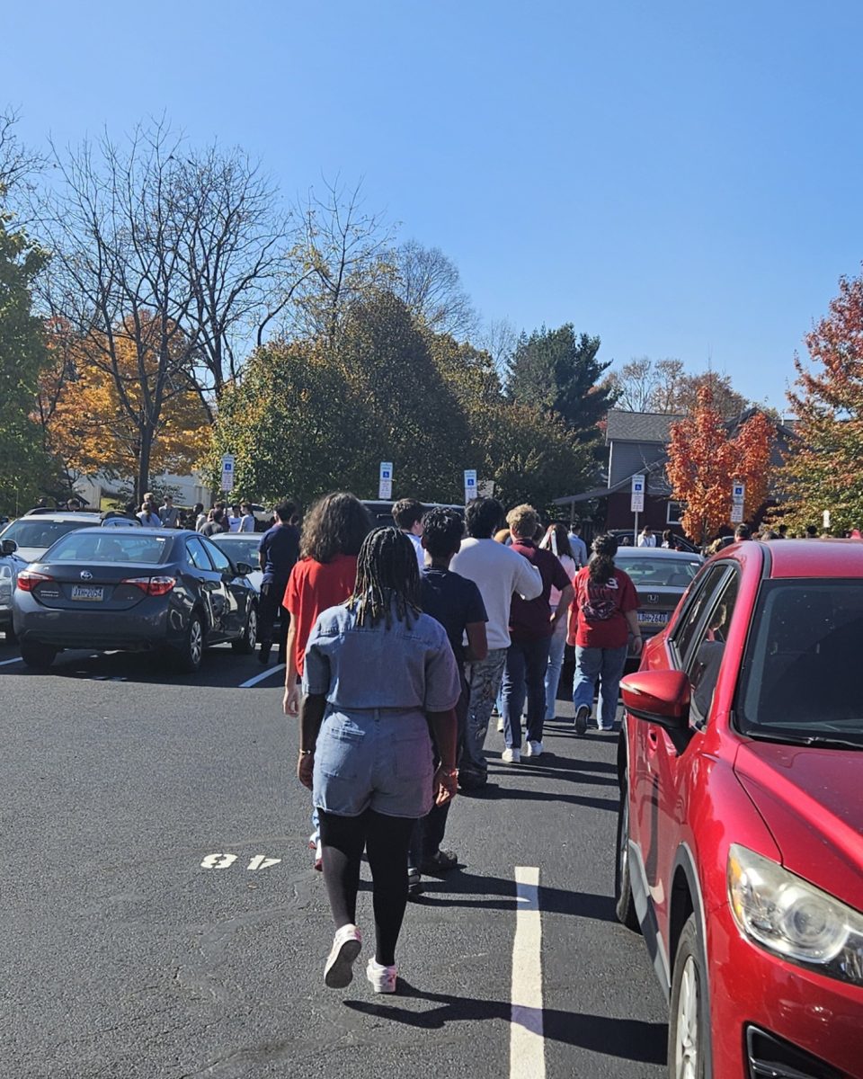 October firedrill, 2024, students exit the building  through the senior parking lot as regular practice for monthly evacuation drills. 