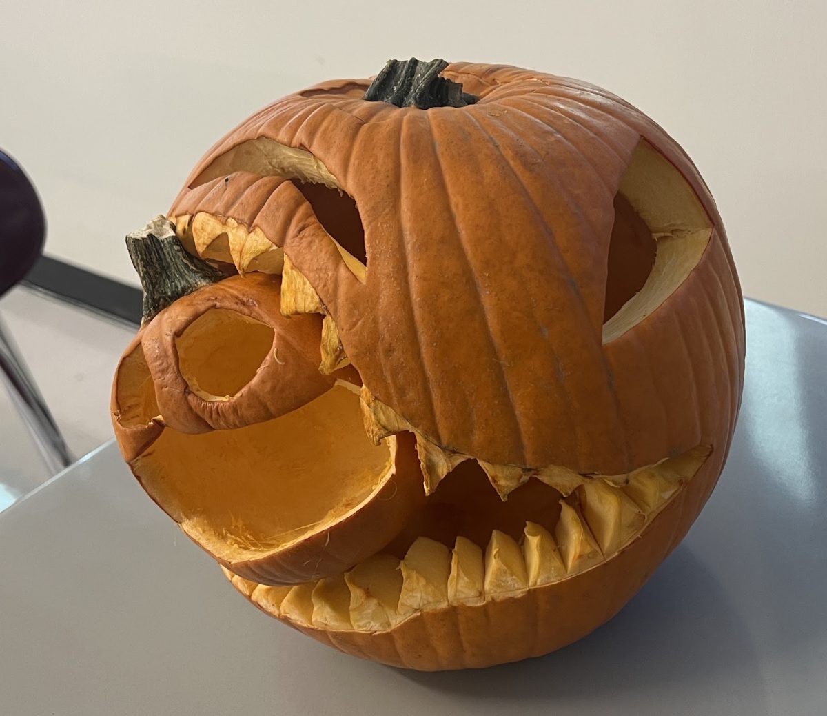 Mr. Kontos carved an evil cannibalistic pumpkin. 