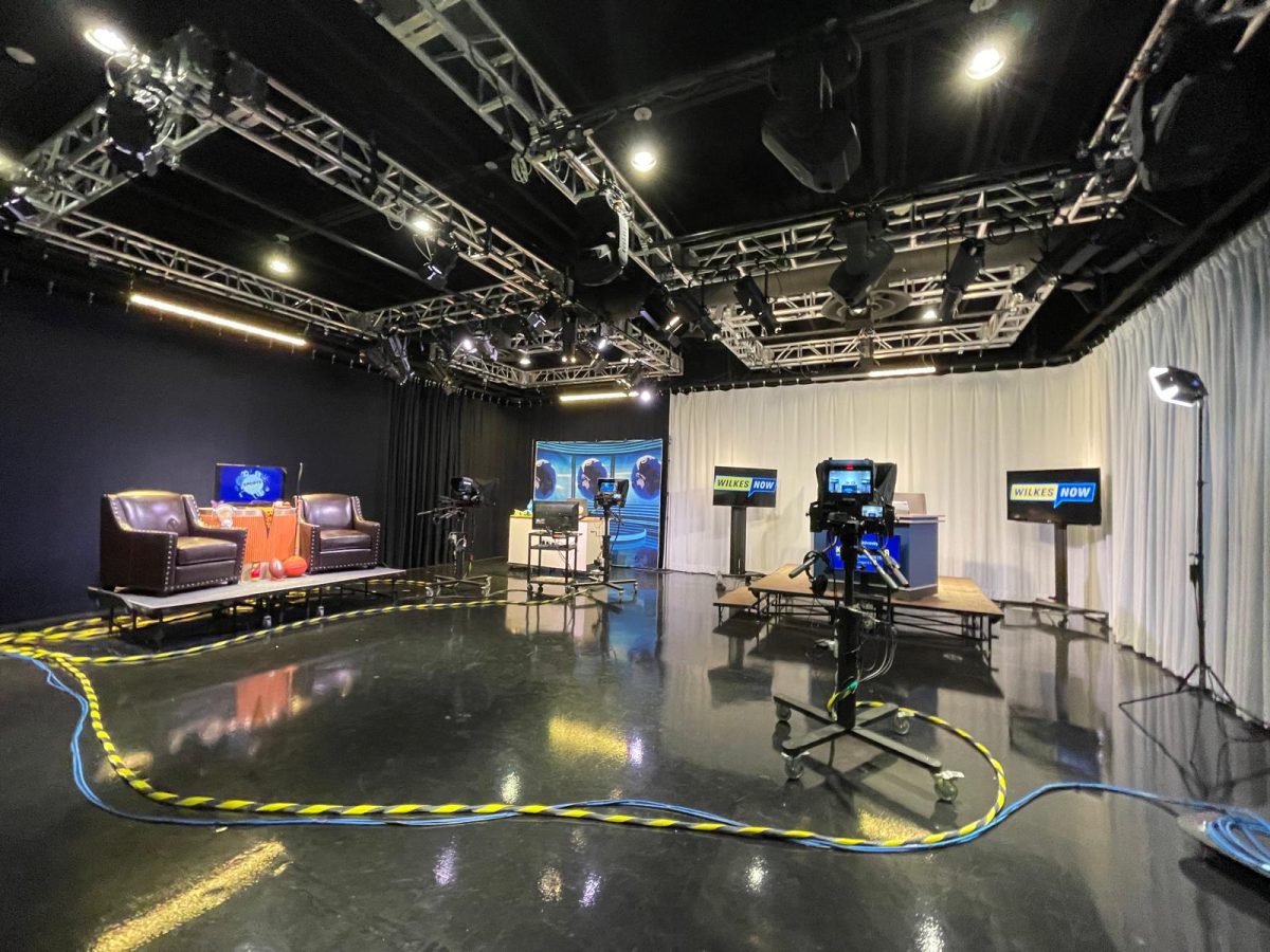 The TV room with the local television set, national television set, and sports television set.