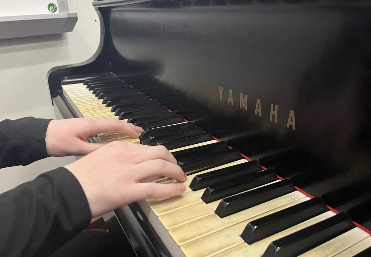 Crista Kopec playing the piano which is one of the most used instruments in songwriting. Photo provided by Megan Lisnik.