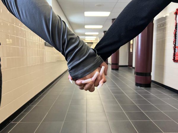 Holding hands was a traditional symbol of being a couple, but "situationships" have confused society. 