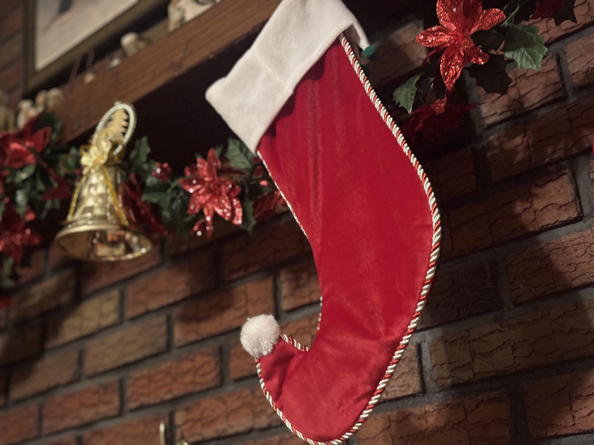 While a classic red stocking is typically depicted, families can personalize stockings for themselves. 